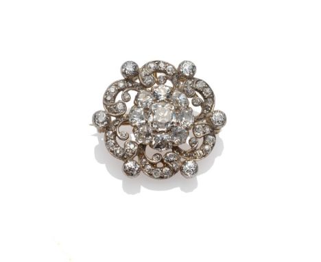 A Late 19th Century Diamond Cluster Brooch, an old cut diamond within a border of eight smaller old cuts, to an outer frame o