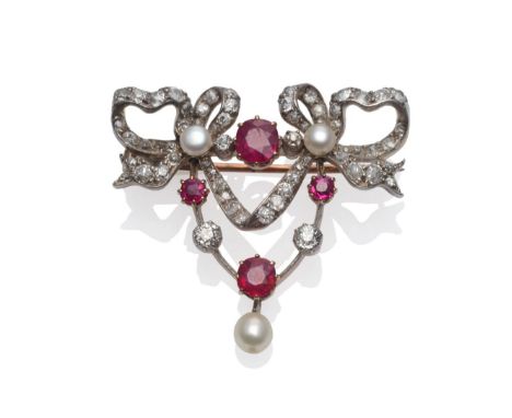 A Ruby, Diamond and Pearl Swag Brooch, circa 1910, a double bow design with linking articulated swag section, set throughout 