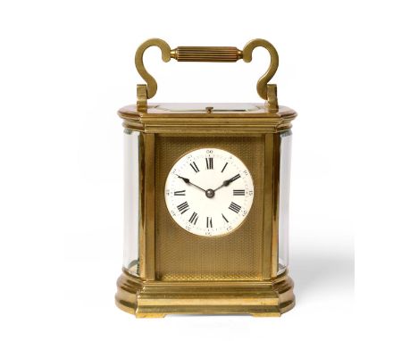 A Brass Striking and Repeating Carriage Clock, circa 1890, carrying handle and repeat button, bowed side glasses, enamel dial