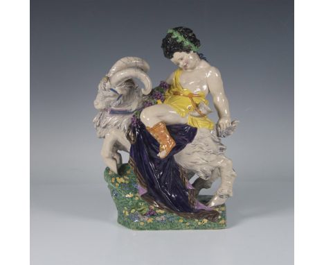 Named in the United States. The Youthful Bacchus. Hand painted gilt and enamel colors of a boy, in yellow, on a leaping goat.