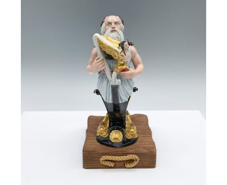 Rare, porcelain figure. Depicts Hibernia, the national personification of Ireland, with golden medieval dolphins around the b
