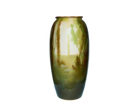 A large vase with gilded trims on the top and bottom. The body features a pastoral setting with a flock of sheep grazing betw