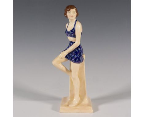 Rare Art Deco beautify in a blue floral bikini, leaning on a sandy-color pillar. Royal Doulton backstamp. Dimensions: 2.75"L 
