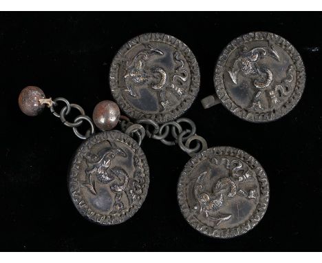 Two pairs of antique cloak fastenings with anchor and sea serpent devices raised in relief