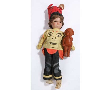 Schoenau &amp; Hoffmeister bisque doll, wearing an Oriental inspired outfit, stamped 1923 2/0 Germany to the back of the head
