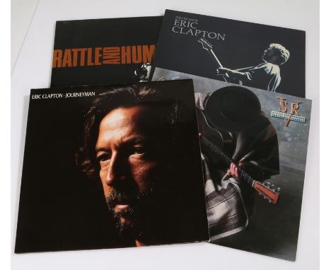 4 x Rock LPs. Eric Clapton (2) - The Cream Of Eric Clapton. Journeyman. Stevie Ray Vaughn - In Step. U2 - Rattle And Hum ( U 