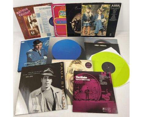 A collection of vintage vinyl albums and box sets. To include: Abba, The Rolling Stones, Status Quo, The Kinks and Paul Simon