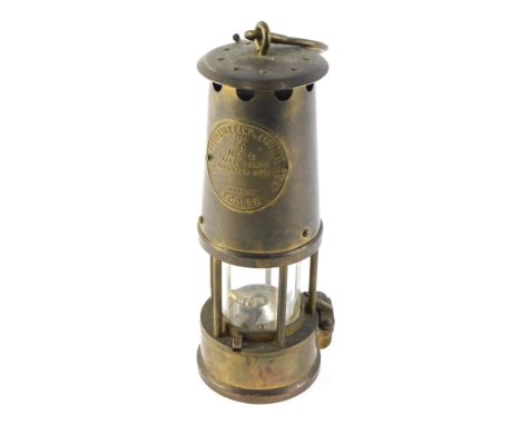 A Protector Type 6 brass miner's lamp, 25cm high. 