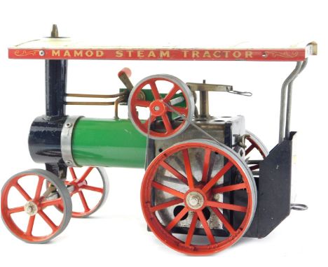 A Mamod model traction engine, painted in typical green, black and red livery, 26cm wide. 