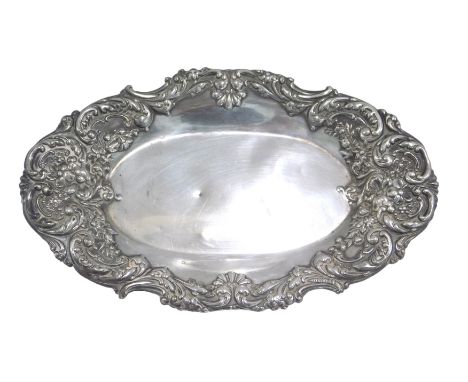 A Victorian silver pin dish, of oval form with embossed floral and scroll border, maker D&amp;F, Birmingham 1899, 1.93oz, 17c