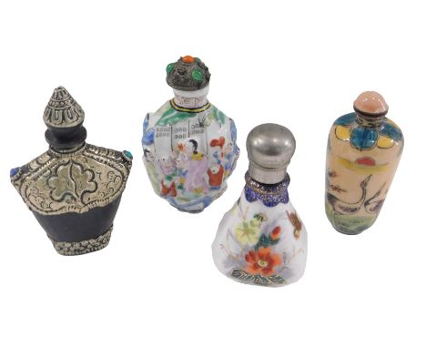 Four ceramic snuff bottles, comprising a Chinese enamel painted snuff, 7cm high, and three others. (4) 