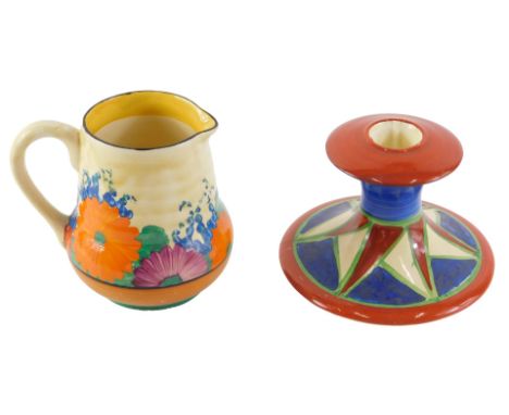 Two Bizarre by Clarice Cliff wares, comprising a candle stand, on a blue, green, red and cream ground, 8cm high, and a crocus