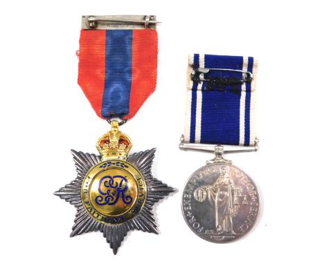 Two police medals, comprising a Faithful Service medal, enamel decorated, on an Elkington bar with red and blue ribbon, 8cm h