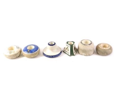Five ceramic match strikes, comprising Puck and Webb, Buckinghams, White Horse Whisky and Base in a Bottle ashtray. (6) 