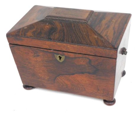 A George III partridge wood tea caddy, with rosewood and boxwood strung borders, and canted corners, the hinged lid enclosing