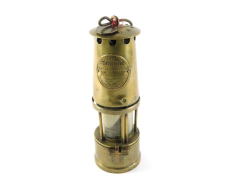 A Protector brass miner's lamp, 28cm high. 