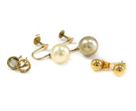 Three pairs of earrings, comprising a pair of cultured pearl and yellow metal screw back earrings, stamped 9ct, a pair of 9ct