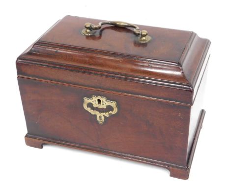 A George III mahogany tea caddy, the hinged lid with brass handle enclosing an interior with three divisions, on bracket feet