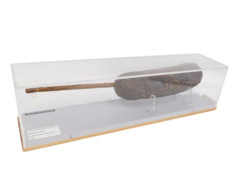 Tribal Art. An Egyptian loot musical instrument, 53cm wide, in presentation Perspex case. 