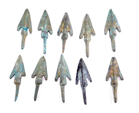 A group of Persian style arrow heads, 4cm high. 