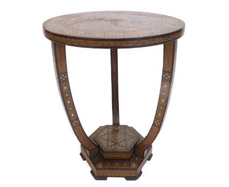 A late 19th/early 20thC Middle Eastern occasional table, the mosaic style top inlaid with various timbers, mother of pearl an