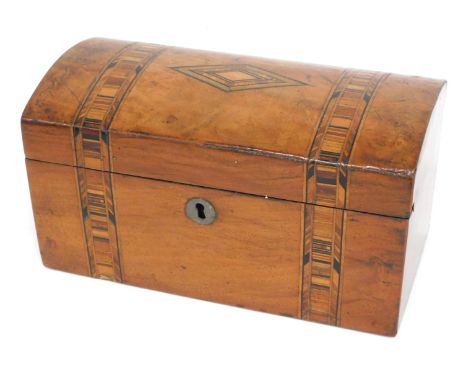 A Victorian walnut and parquetry dome topped tea caddy, interior incomplete, 22cm wide.  