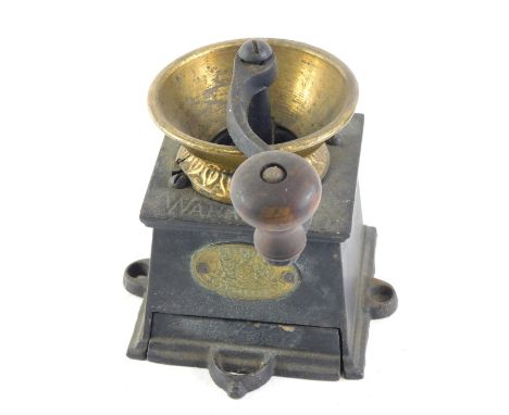 An F Peugh &amp; Co of Wednesbury iron and brass coffee mill or grinder, 14cm wide. 