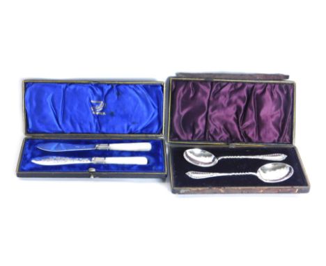 Two presentation sets, comprising a mother of pearl and silver plated knife set, in G Seiffert of Dumfries box, each with sil