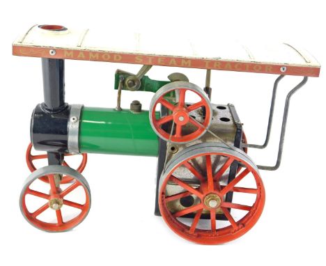 A Mamod miniature steam tractor, in green, red, and black livery, 24cm long. 