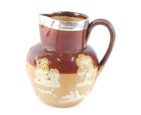 A late Victorian Doulton Lambeth stoneware jug, decorated with tavern scenes, hunting dogs, stag, etc., with silver rim, Lond