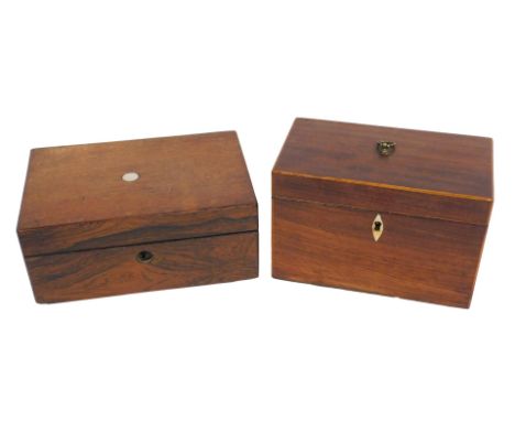 A 19thC mahogany and boxwood strung tea caddy, the hinged lid enclosing a division, 20cm wide, and a small rosewood box. (2) 