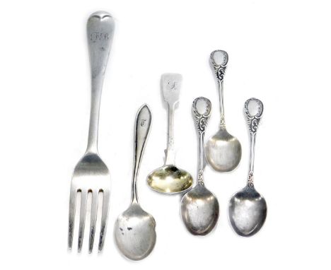 A group of silver cutlery, comprising three Edward VII silver scroll pattern teaspoons, a silver teaspoon bearing the initial