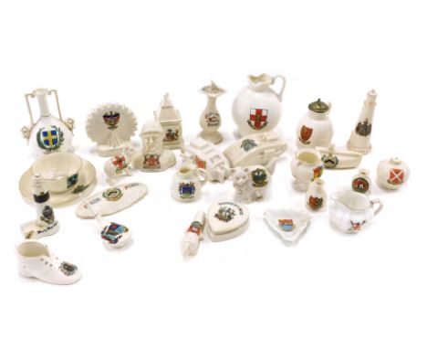 A quantity of crested china, to include tanks, some Lincoln pieces, ferris wheel, sundial, etc. (1 tray) 