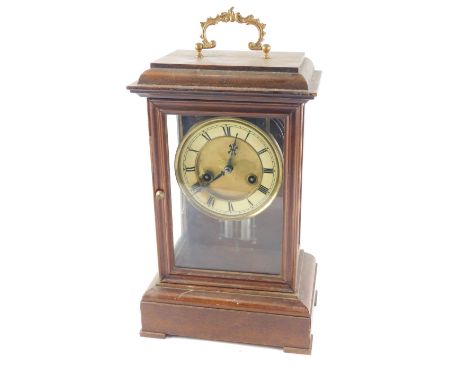 A 19thC continental mantel clock, the paper dial with Roman numerals, in a beech case, 35cm high. 