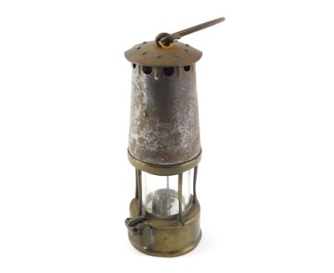 A steel and brass miner's lamp, lacking plate, possibly Protector Type 6, 26cm high. 