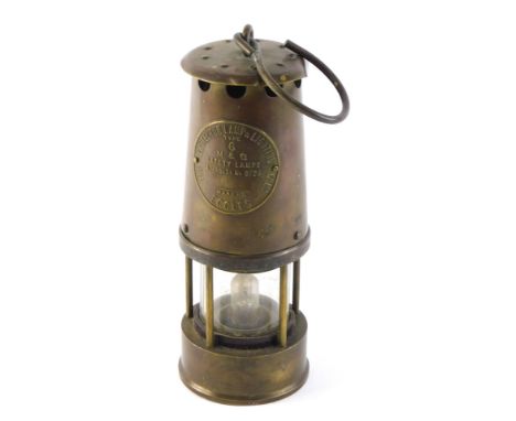A Protector brass miner's lamp, type number 6, 23cm high. 