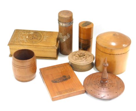 Treen, comprising an ebony dice shaker, a rectangular box bearing Windsor transfer print, a Mauchline ware Isle of Wight need