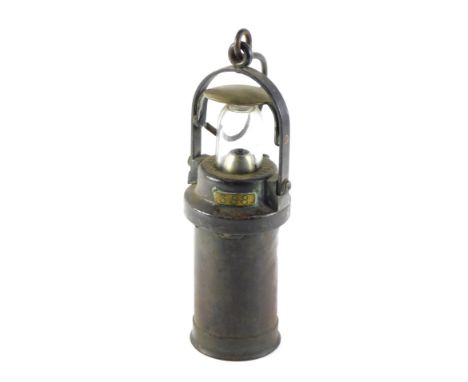 A C.E.A.G. of Barnsley steel and brass miner's lamp, numbered 388 and 369 respectively, 28cm high. 
