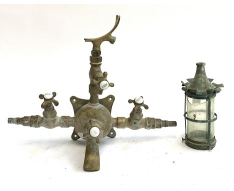 A French brass and enamel bath/shower tap and a small lantern 