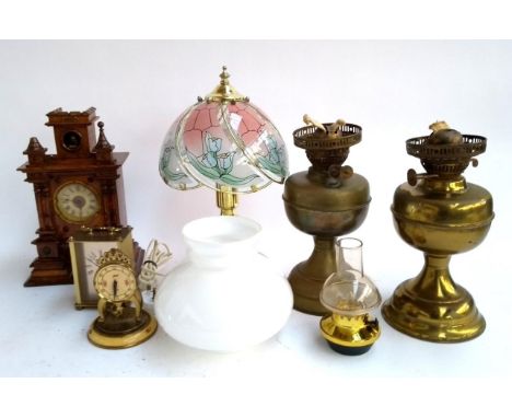 A mixed lot to include two brass oil lamps, an electric 'oil lamp', Buckingham quartz mantel clock etc 