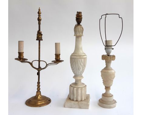 Two marble table lamps, the tallest 46.5cmH to top of fitting, together with a gilt metal two arm table lamp 