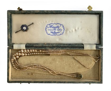 An Ainette simulated pearl three strand necklace (af); together with a Royal Army Service Corps silver brooch 