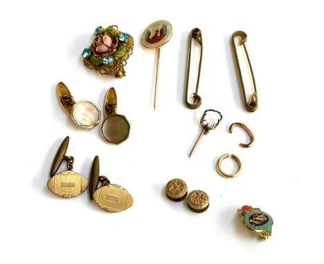 A small lot of jewellery to include a pair of yellow metal and mother of pearl cufflinks; one other pair of cufflinks; dress 