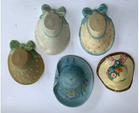 A Beswick floral ceramic wall plaque in the form of a hat, 25cmL, together with a Brentleigh ware wall plaque and 3 others 