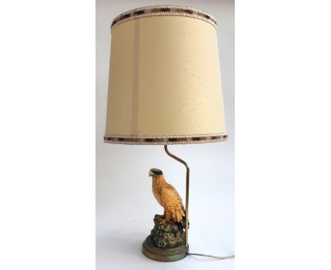 A resin table lamp in the form of an eagle, signed I. Giannelli '73, 69.5cmH to top of shade 