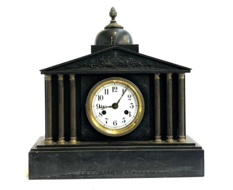 An architectural slate mantel clock, classical pediment, white enamelled dial flanked by 6 reeded doric columns, 42.5cmL 