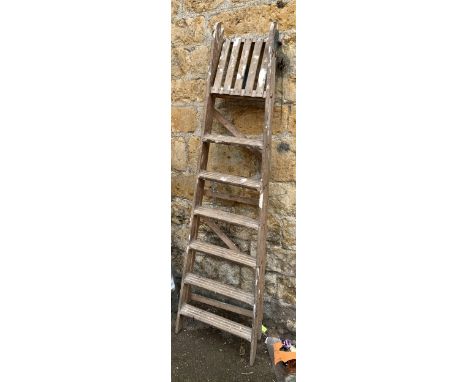 A vintage siz run folding wooden step ladder, approx. 185cm high 