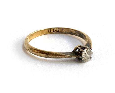 An 18ct gold and diamond ring, size M 1/2, approx. 1.6g 