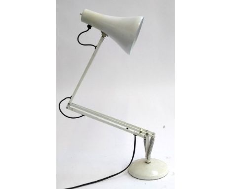 A white angle poise lamp 