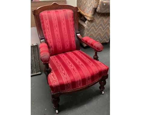 A mahogany framed open armchair, with stuffover serpentine seat, on carved legs and ceramic casters, 70cmW 